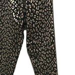 AQUA  black and gold animal print 7/8 leggings. Photo 2