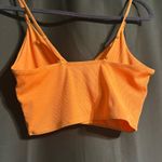 Women’s workout top Orange Size M Photo 1
