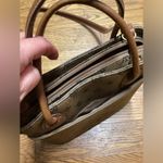 Rosetti purse. Dark taupe with brown leather handles and strap. Super cute Photo 13