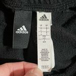 Adidas Women’s  black ankle length straight leg sweatpants ankle zip Large Photo 2