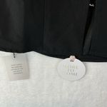 Chic Black Backless Dress with White Bow Details Photo 6