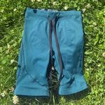 Gym shark draw string. Super cute. no size, but definitely xs/small Photo 0