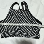 Kona Sol Medium Kona Sola black and white striped swim top. Photo 4