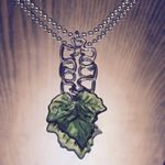 Puzzle Piece Green Leaf Necklace Photo 1