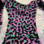 Fabletics  BRA ON THE GO MEDIUM IMPACT SPORTS BRA GRASS GREEN SAFARI SPOTS/BLACK Photo 5