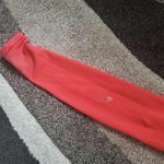 Lululemon  athletica reversible leggings in orange and  red in size 4 Photo 3