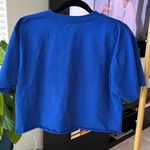 Elton John cut off T Photo 1