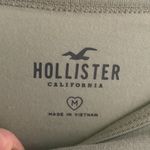 Hollister NWOT M Cropped Short Sage Green Teens Long Sleeve Graphic T-Shirt Photo 2