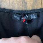 Pretty Little Thing  black strappy split hem flare jumpsuit‎ Photo 5