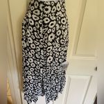 ASOS COPY -  DESIGN button through midi skirt with split in mono daisy print Photo 5