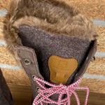 Salomon  tall fur boots size 7.5 Photo 3