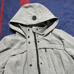 Calvin Klein Performance heather grey fleece lined waterproof coat w/ hood
L Gray Size L Photo 1