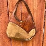 Brown and Tan Hobo Bag with Crescent Shape Photo 1