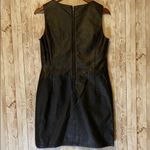 Romeo + Juliet Couture NWT Kenzie woman’s black dress. Faux leather in the front w/zipper in the back Faux leather / outside 100% polyester Backside 86% rayon 14% polyester 35 length x 17 wide (Sh) Photo 4