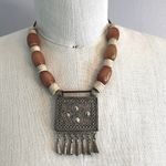 Handmade Vintage authentic African tribal necklace with metal center amber colored beads Photo 0
