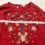 Ophelia Roe  beautiful  top. medium. The sleeves are awesome. Flowers are unique Photo 6