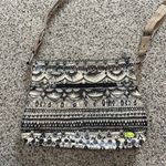 Sakroots  Crossbody Peace Bag Purse Coated Vinyl Black Tan Zip Pockets Photo 3