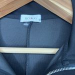 Ostaug Romper Woman’s size M Black Short Sleeve Zip Photo 3