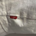 Levi's white branded crop top - labeled as M but is more of a Small Photo 4