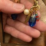 Handcrafted fish dangle earrings Gold Photo 1