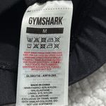 Gymshark  non stop sports bra black size medium size pocket zips front clasps bck Photo 5