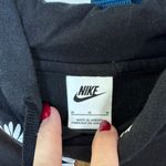 Nike Black Hoodie with White sunflower Accents Photo 1