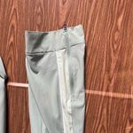 New Balance woman's sports Joggers with zips at bottom Size Large Photo 9