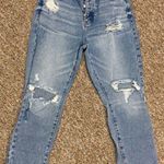 PacSun cropped rugged mom jeans - Size medium. gently warn& are in excellent condition for these distressed jeans. measurements approximately14” waste x 11” rise x 35” long. Non smoking home. priced to sell at as is condition. Don’t like my price, make reasonable offer! And thank you for checking my closet. Photo 0