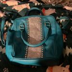 Charming Charlie Teal Backpack with Silver Accents Photo 0