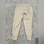 Nike  Women's YOGA Flow 7/8 Pants Size S Photo 3