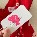 L'ATISTE *L’atiste Amy Red Floral Faux Wrap Romper Photo 41