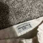 Abercrombie & Fitch White Abercrombie High-Rise Skinny Jeans Photo 3