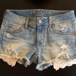 American Eagle Outfitters AEO NWOT distressed Lace Pocket Jean Shorts Blue Size 0 Photo 0