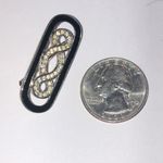 Elegant Vintage Silver Tone Rhinestone Infinity Brooch Photo 2