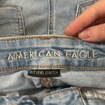 American Eagle light wash distressed High-rise Jean Shorties denim shorts size 0 Photo 7