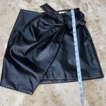 Sunset & Spring Black Patent bow mini skirt. Size XS nwt Photo 1