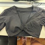 Amazon  twist front black longsleeve workout top Photo 0