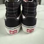 Vans  Classic Black and White High-Tops Photo 5