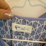 GREG NORMAN WOMENS BLUE WHITE PLAY DRY GOLF ⛳️ SHIRT SIZE XL Photo 1