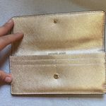 Michael Kors  Metallic Gold Tote and Wallet Set Photo 4