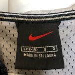 Nike Vintage woman’s size large 12-14 navy and white lined 1/4 zip windbreaker Photo 6