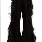 MARQUES' ALMEIDA
Feather Photo 14