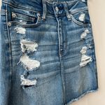 American Eagle AEO Next Level Medium Wash Distressed Ripped Jean Skirt Size 0 Photo 1