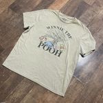 Winnie The Pooh pastel yellow graphic Tshirt Size XL Photo 1