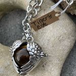 Boutique Tigers Eye stone in a heart shaped necklace cage. 36”chain Photo 4