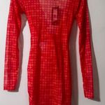 EGO LONG SLEEVE KNOTTED CUT OUT DETAIL MINI BODYCON DRESS IN PINK SPOTTY MESH Photo 6