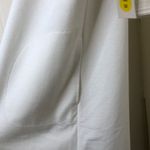 Alyn Paige  Medium Ivory Sleeveless Dress with a Cuffed Neck Photo 8