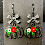 Black Bow with Red and White Floral Accents‎ Cute Pumpkin Dangle Earrings Photo 0