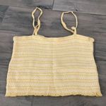 Lottie Moss  yellow smocked tank top Photo 1