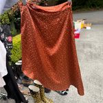 Pretty Little Thing  Burnt Orange Polka Dot Midi Skirt Photo 1
